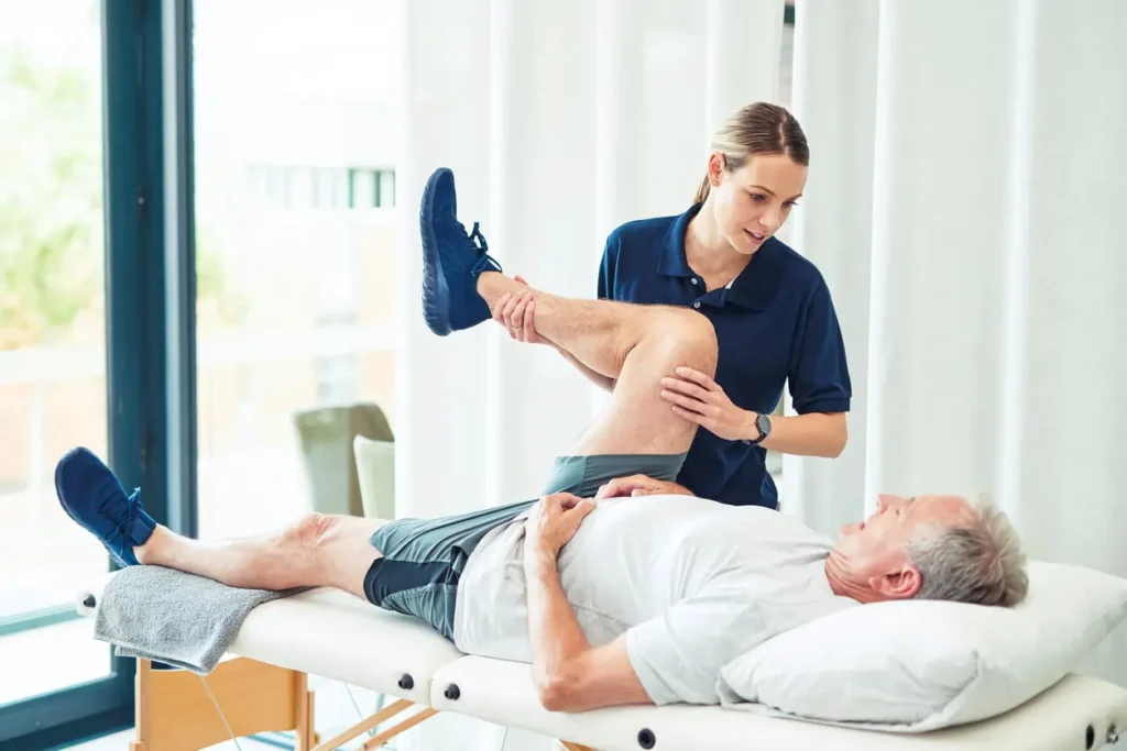 Revitalising Recovery: Effective Rehabilitation Strategies for Muscle Injuries 3 Physiotherapist assisting a patient with muscle recovery exercises Colchester